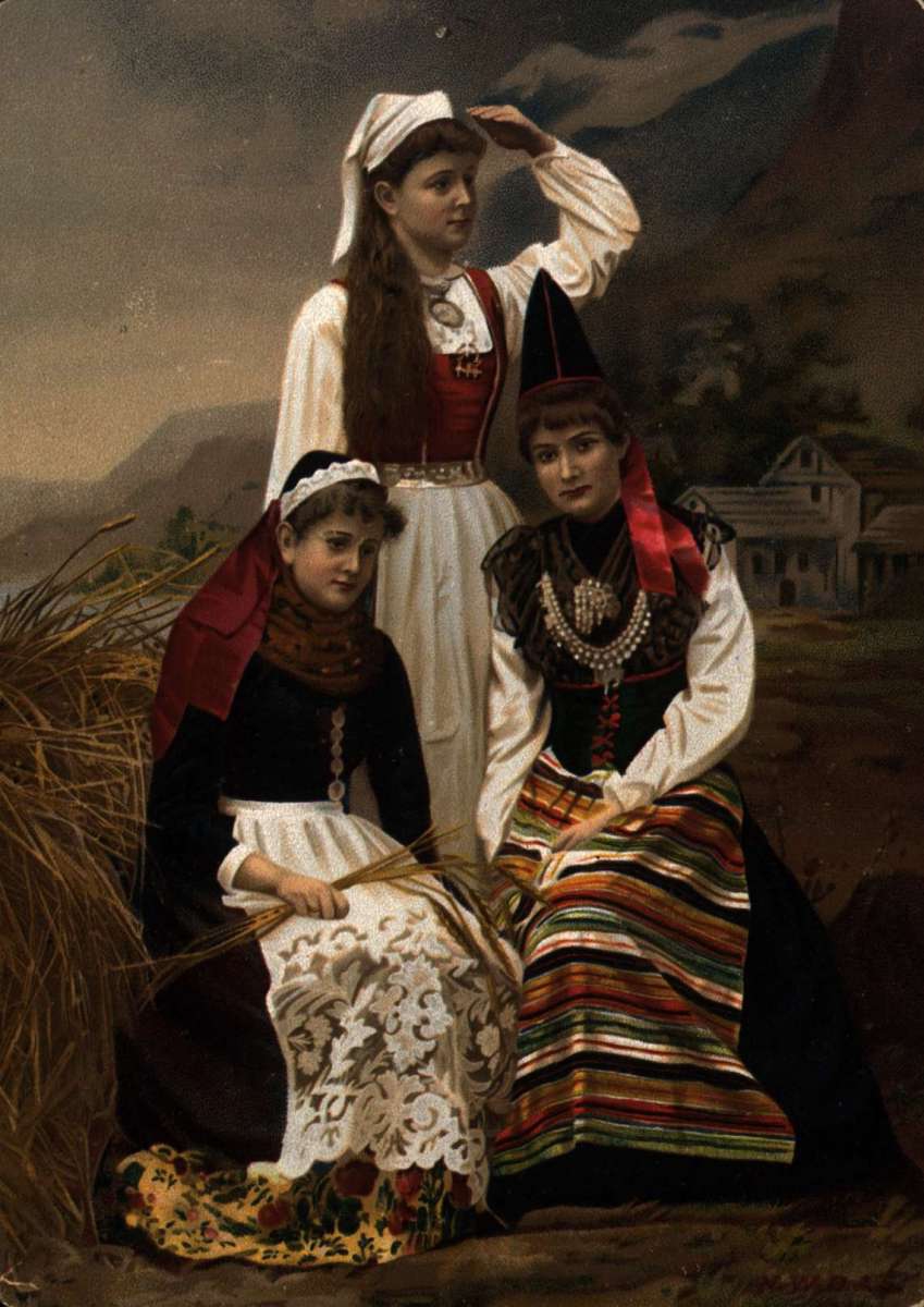 Postkort. Julehilsen. Tre kvinner i folkedrakter. Datert 24.11.1892.