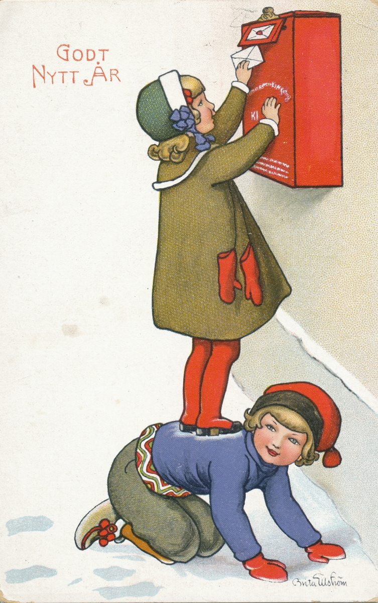 Barn som lägger på post i brevlådan.