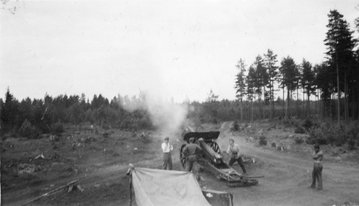 Kanon m/1917. 10,5 cm. Eldgivning.