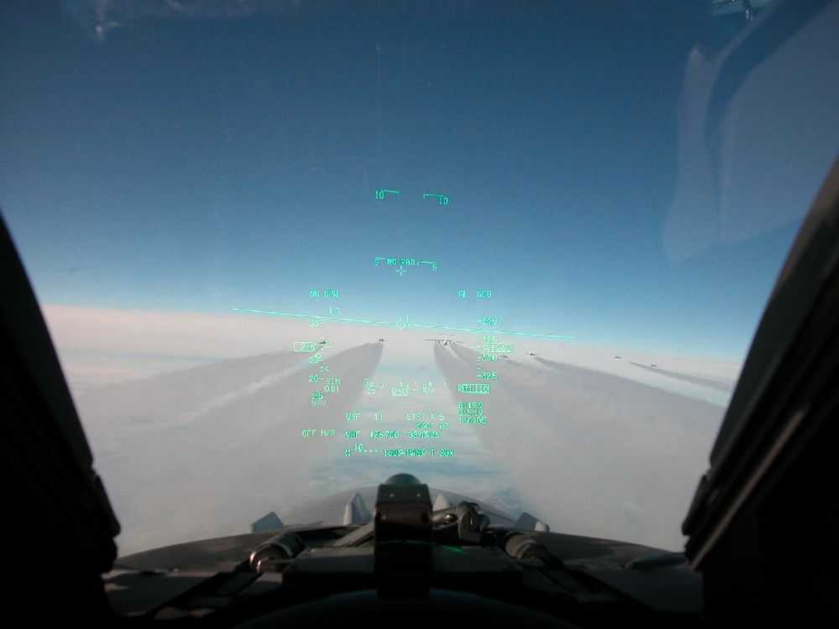 Luftfoto. Utsikt fra vindu i cockpit.
