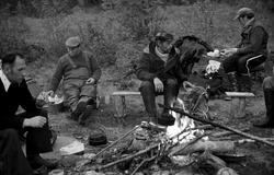 Landskap med person(er).