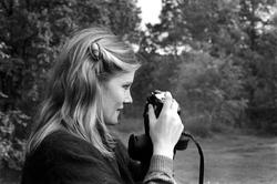 Landskap med person(er).