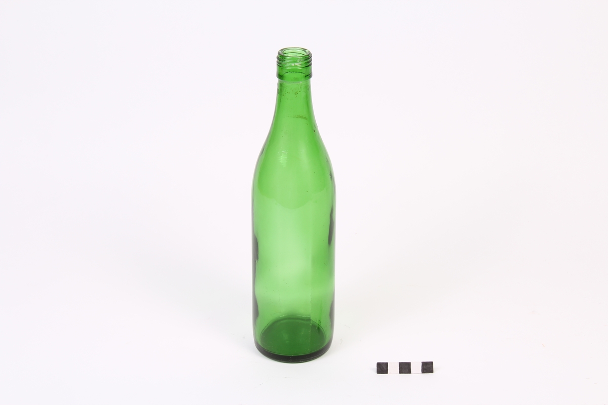 Grøn glasflaske.