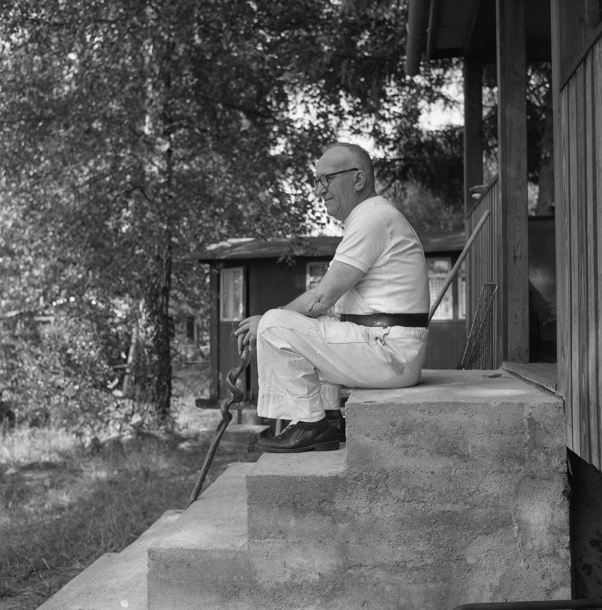En man på trappan.
8 juli 1959.