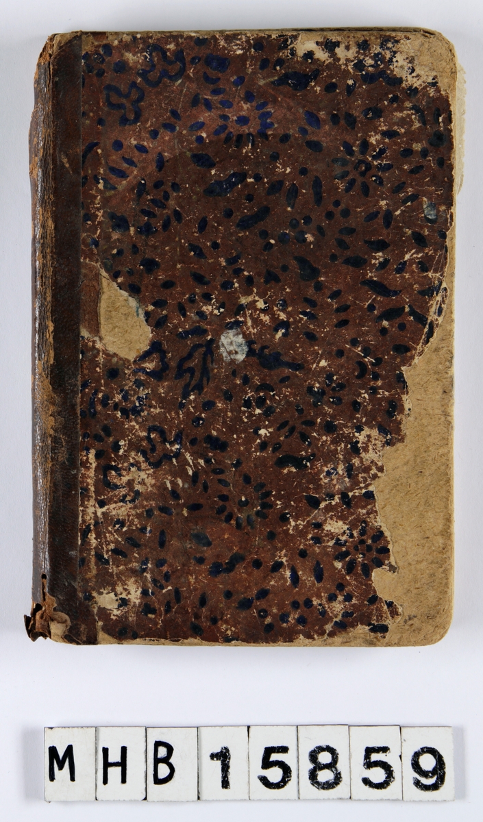 Religiøs sangbok. Bok med pappomslag trukket med brunt mønstrete papir. Sydd bokrygg med lærforsterkning. 157s. Gotisk skrift.