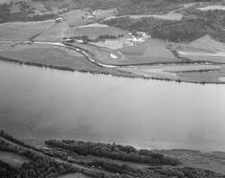 Flyfoto som viser Glomma og landskapet langs elva på strekni