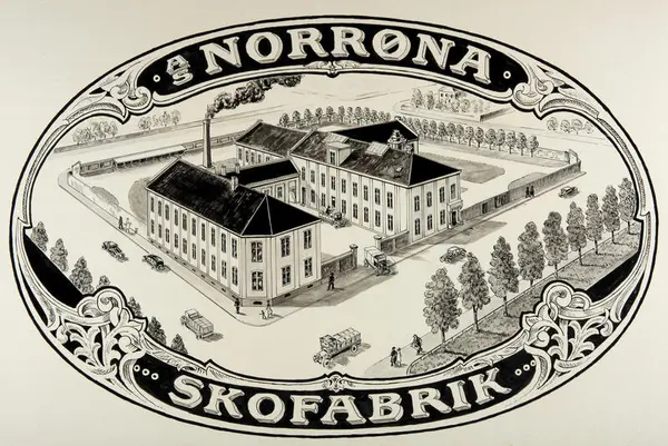 Ovalt reklameskilt i hvitt metall med svart tegning av fabrikklokalene til Norrøna skofabrikk.