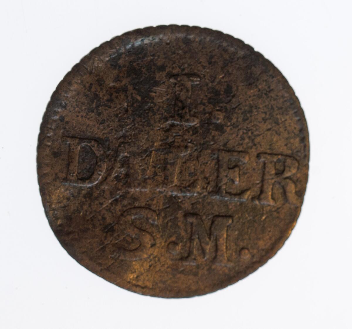 Mynt, 1 daler s.m. 1715 från Karl XII tid,; Det fanns i förpackningen med inventarienummer M32325.