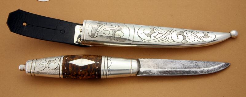 Knife by Nicolai Johansen in birch and silver. Embellished with acantus tramplings and inlays.