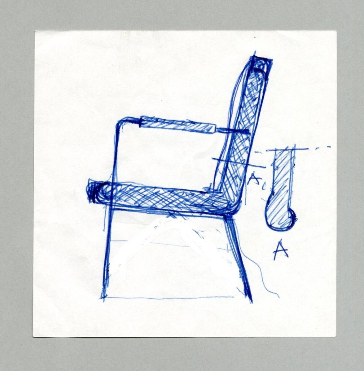 Fåtölj/stol med stål armstöd och rygg och sittdynan i randigt tyg.