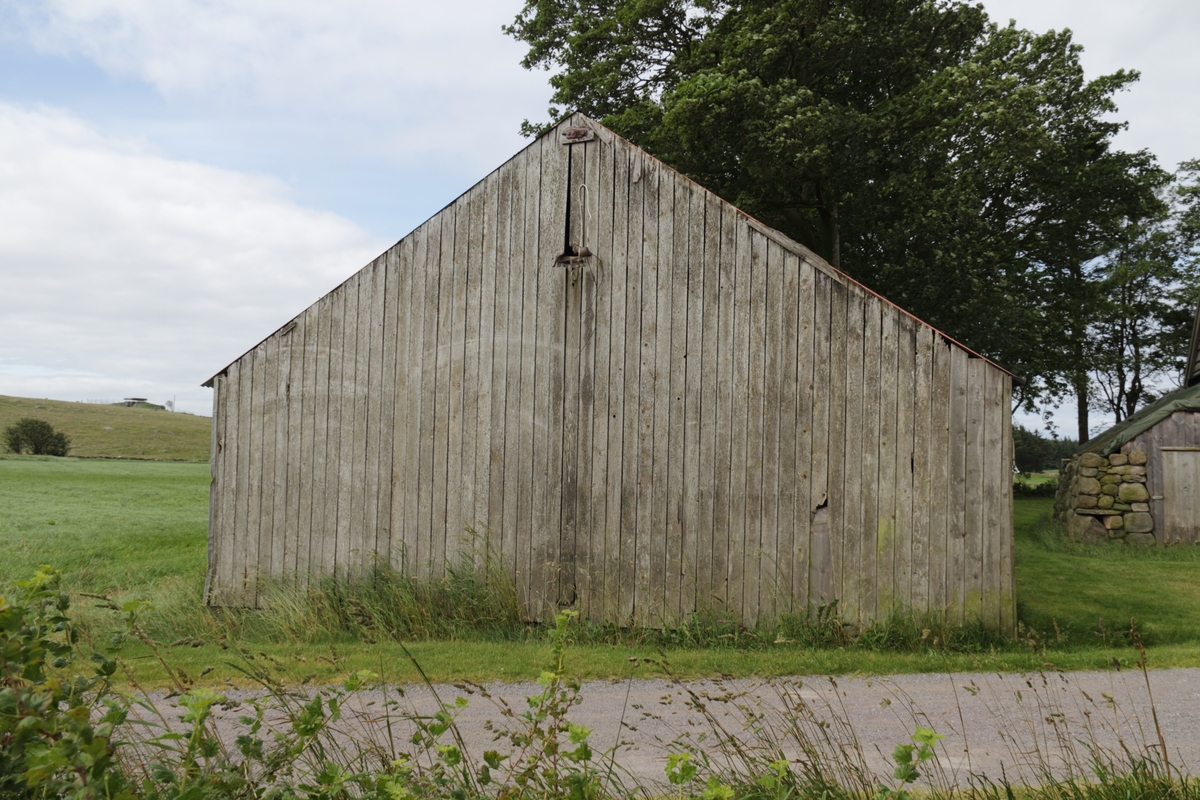 Del av det bevarte tunet Audamotland. Bygd som kjerrehus, i dag i bruk som material-lager for restaureringsarbeidet i tunet.
