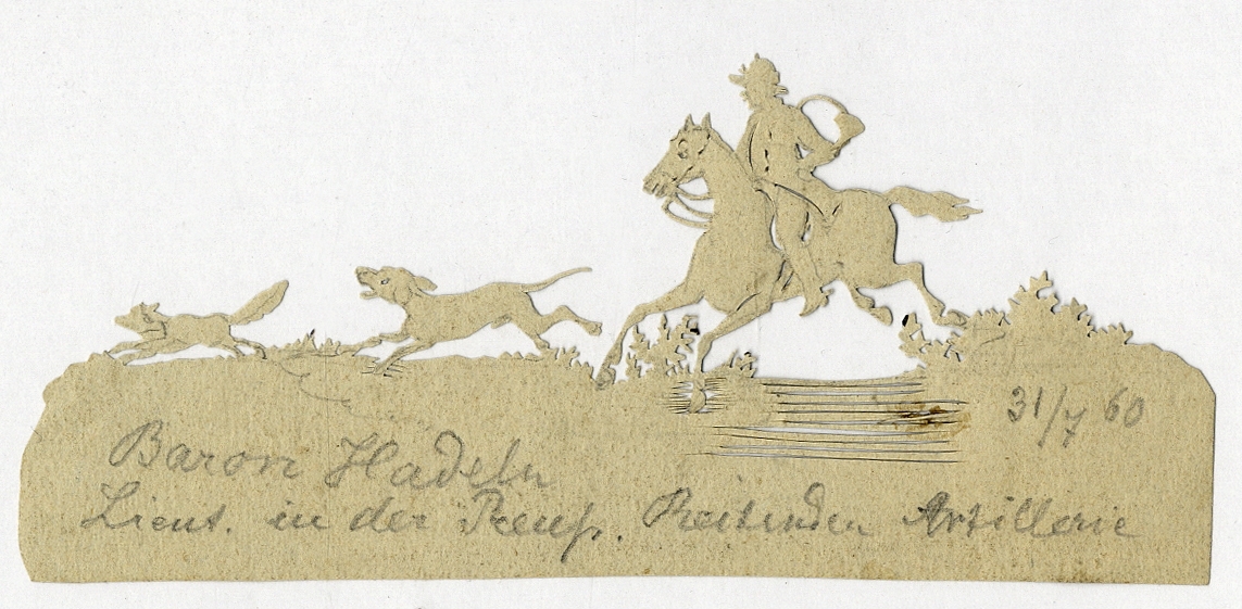 Silhuettklipp i svart papper. En ryttare med jakthorn och hund på väg över ett fält, efter en räv.