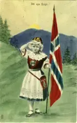 Postkort. "Det nye Norge." Kvinne i "bunad" med norsk flagg.