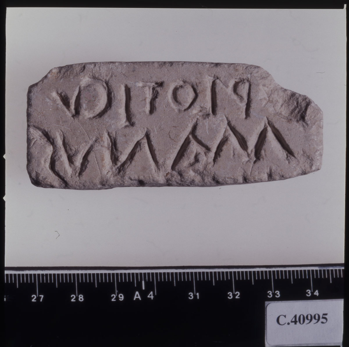 EtnoNo: 39809a.
Stamp with latin inscription.