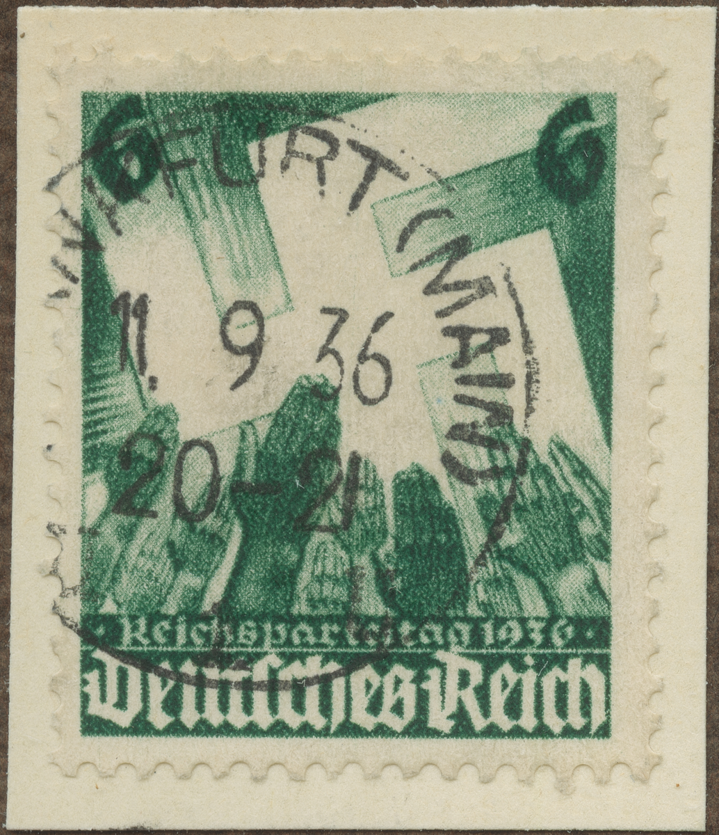 Frimärke ur Gösta Bodmans filatelistiska motivsamling, påbörjad 1950.
Frimärke från Tyskland, 1936. Motiv av Hakkors- Symbol Rikspartidagen i Nürnberg