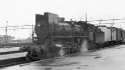 Damplokomotiv type 26a nr. 215 med persontog fra Oslo Ø til 