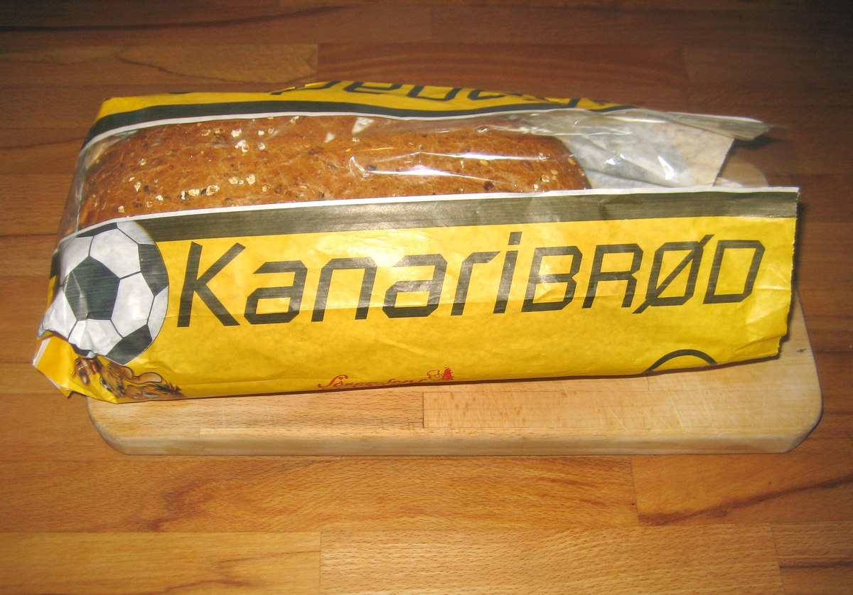 Motivene på brødposen viser til Lillestrøm Sportsklubb LSK. Posen er gul med sorte striper og sorte bokstaver i fotballklubbens farger. Det er en liten kanarifugl (maskott) på posen i gul og sort fotballdrakt.