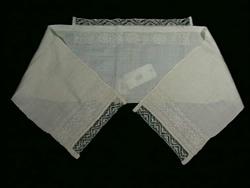 Hodebekledning, del av