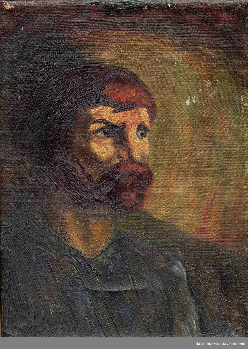 Portrett av en mann med rødbrunt hår og skjegg.