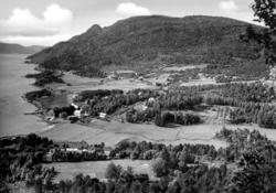 Oversiktsfoto, trolig fra Nesset kommune,hvor vi ser strandl