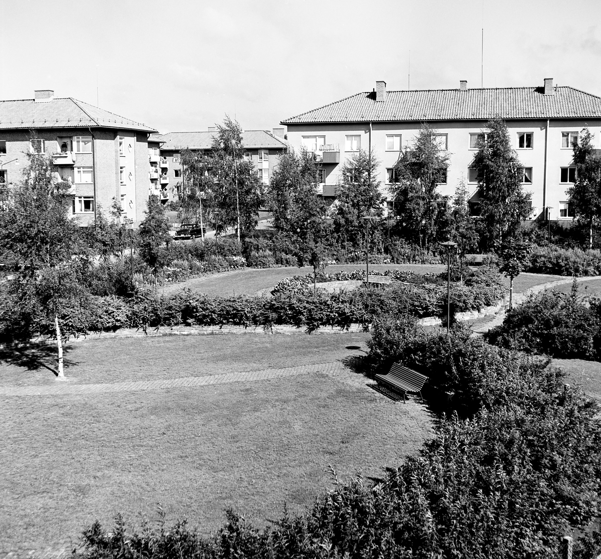 Någonstans i Värmland - från slutet av 1950-talet. Kommentar från användare: "Norrstrand, parken mellan Ulvsbygatan och Norrstrandsgatan. Huset närmast är Ulvsbygatan 16".