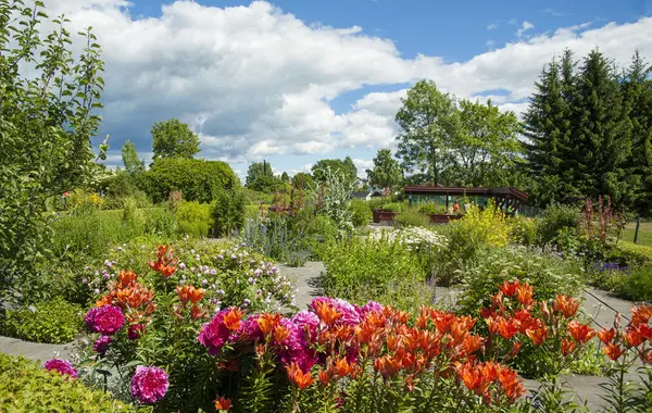 Pink and orange flowers in the Herb Garden.