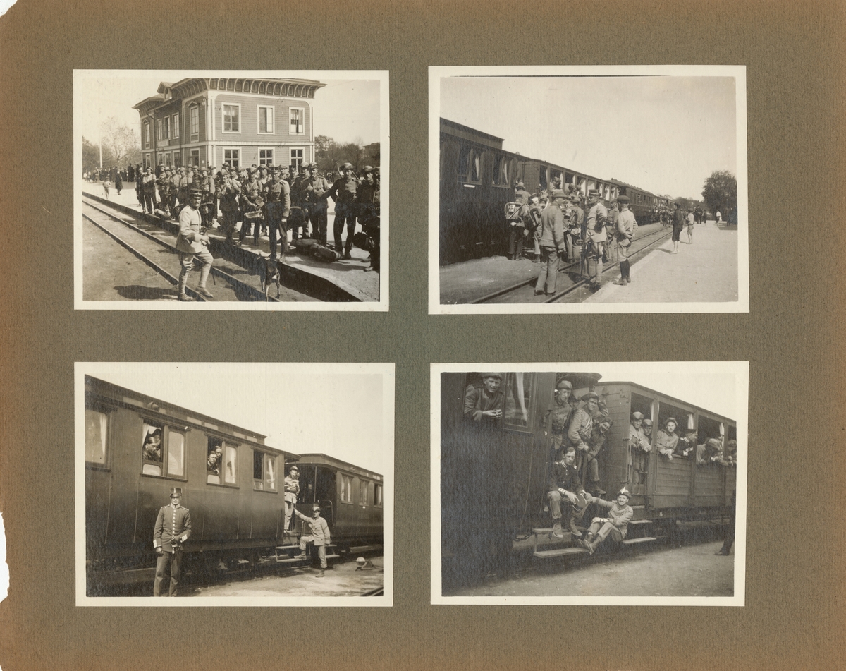 En grupp soldater samlade på tågstation inför truppförflyttning.