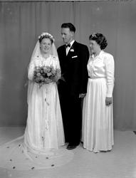 Jenny og Peder Grødal. Portrettbilde av et brudepar. Fra Nor