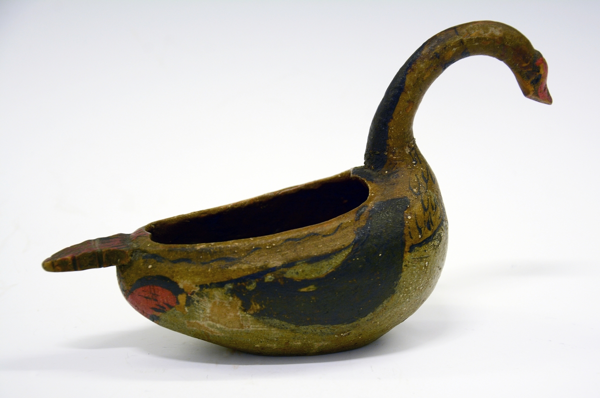 Øland med lang hals, malt i flere farger og datert 1769. Fra protokollen: 13 høns (A-M) til at øse med.