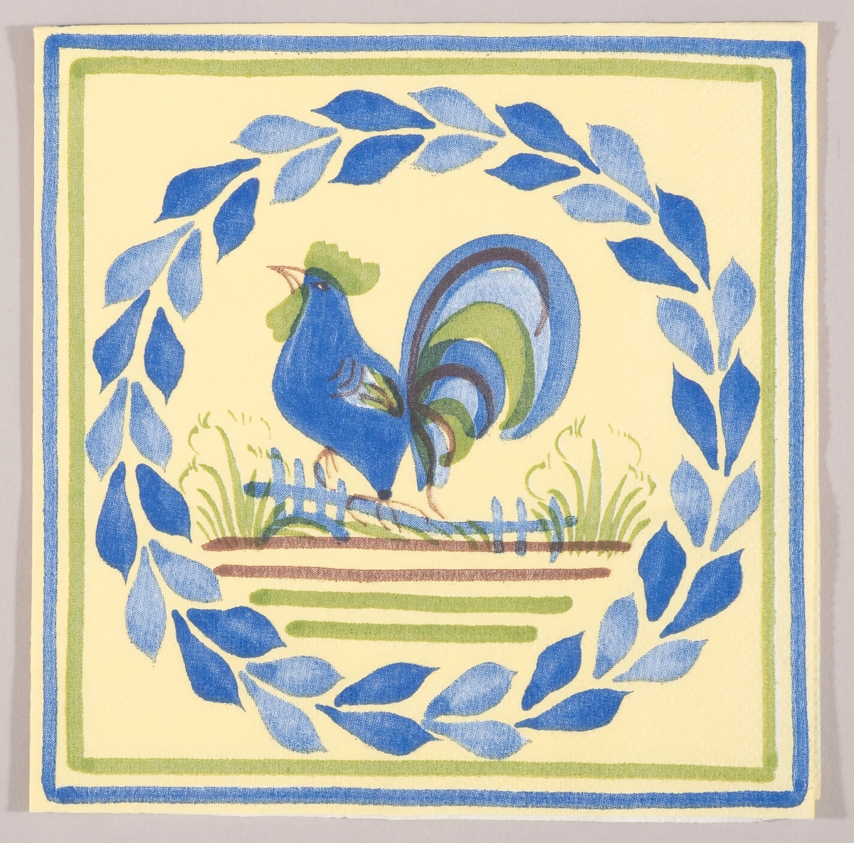 *en blå hane sitter på et gjerde. En rund krans av blå blader