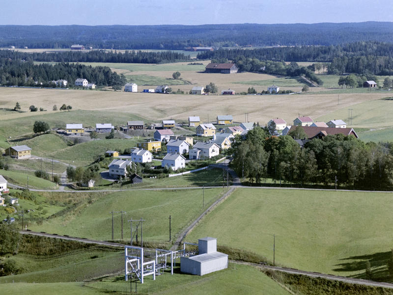 Flyfoto eller skråfoto av Gudimfeltet og Dørjehaugen, Rakkestad 11. sept. 1963.
