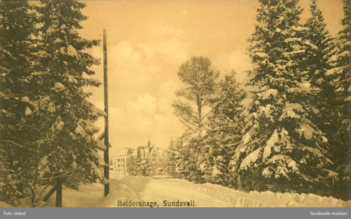 Vykort med vintermotiv över Baldershage i Sundsvall.