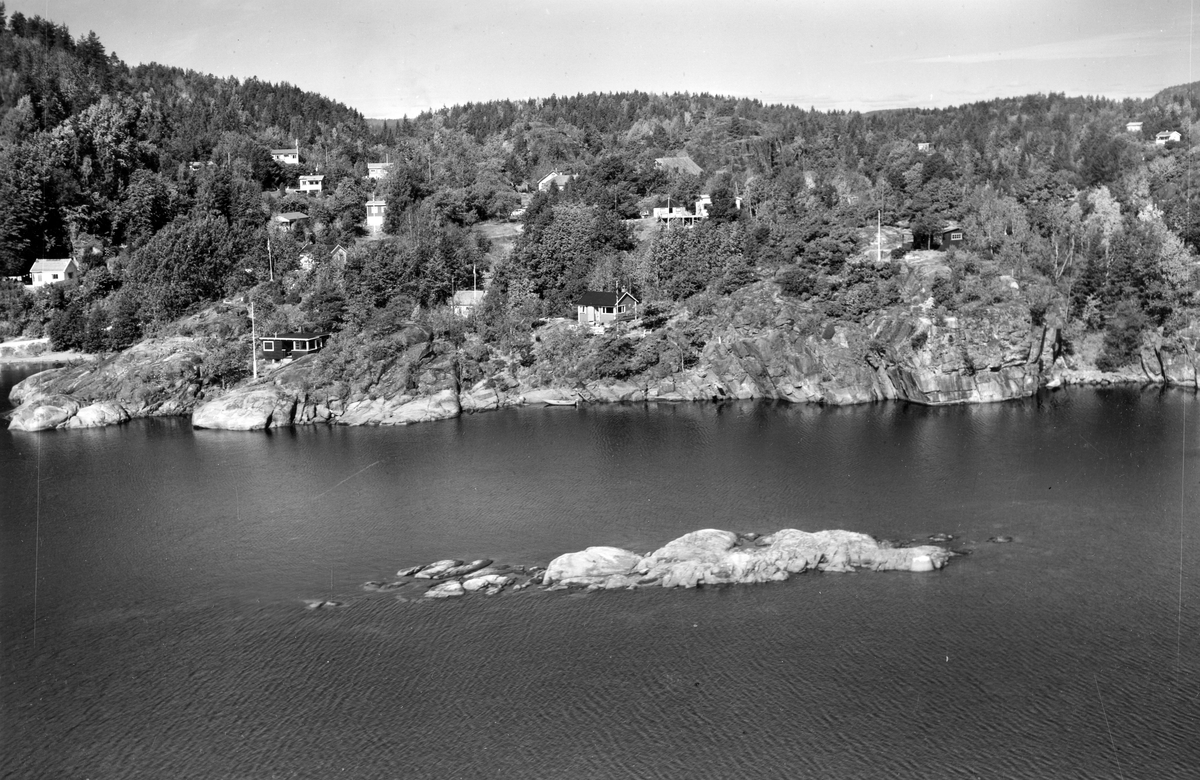Flyfotoarkiv fra Fjellanger Widerøe AS, fra Porsgrunn Kommune. Bjønnes. Fotografert 08.08.1959. Fotograf J Kruse