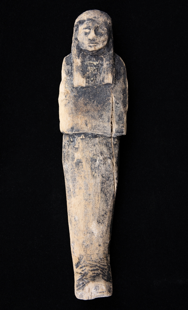 Mumiedocka från Thebe. 19 dynastin. Uschepti av äldre modell. 

Uscheptin var en av flera identiska figurer (runt 300) som skulle utföra dagsverken åt den döde i dödsriket, en docka för varje dag.