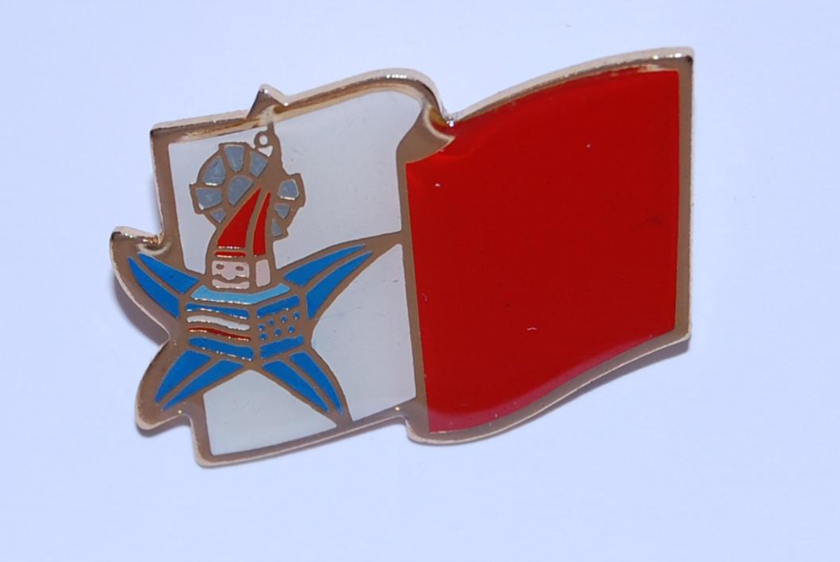 Merke med motiv av det maltesiske flagget og Magique; maskoten for de olympiske vinterleker i Albertville i 1992.