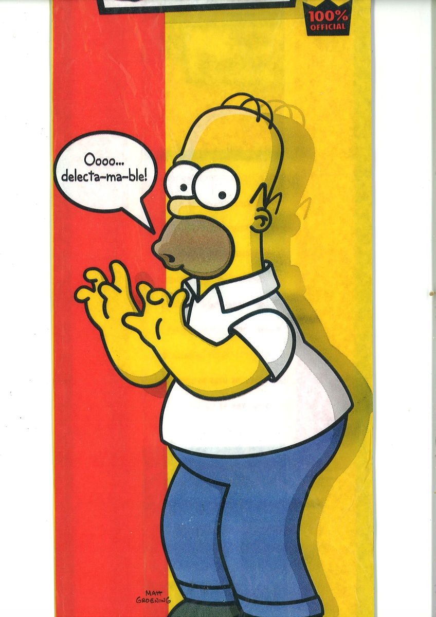 Forsiden: Motiv er tegneseriefiguren Homer Simpson fra the Simpsons. Han står og sier (i en tegneserieboble) "Oooo...delecta-ma-ble! Baksiden: Hele Simpson-familien + hund og katt.