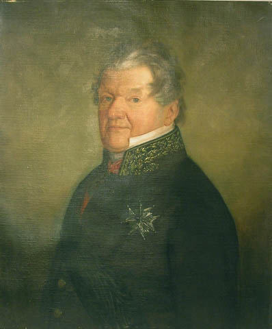 Porträtt i olja av friherre C.D. Skogman.

En mässingsskylt med text: "Frih C.D. Skogman, t.f. Öfverpostdirektör 1829-1830, 1831-1832". Duken är fäst på en plåt.