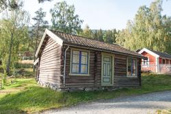 Landhandel, opprinnelig husmannstue fra Gudbrandsrud i Nes