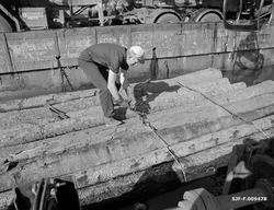 Tømmeropptak fra Bjørnstadbrygga ved Femsjøen i Halden i Øst