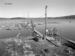 Tømmeropptak fra Bjørnstadbrygga ved Femsjøen i Halden i Øst