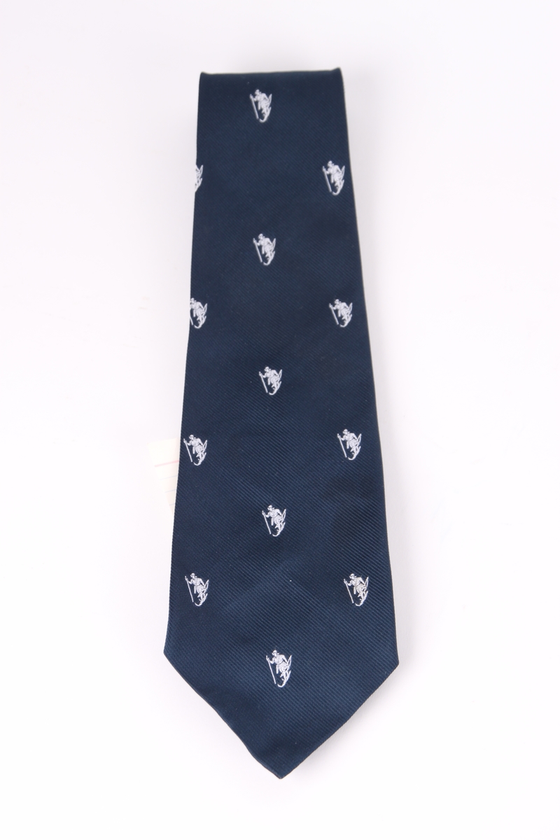 Skiforeningens slips dekorert med motivet "fuglemannen" kjent fra Skiforeningens logo.