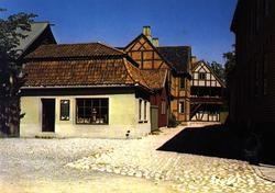 Postkort. Den gamle butikken flyttet til Gamlebyen, forstads