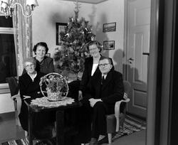 Familien Hanem. Lars, Tora, Marit og Berghild. Foto av en fa