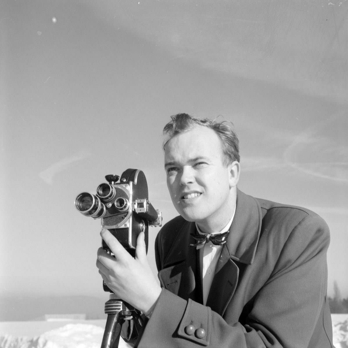 Norsk landbruks jubileumsutstilling 1959. Fotografen bak kameraet.