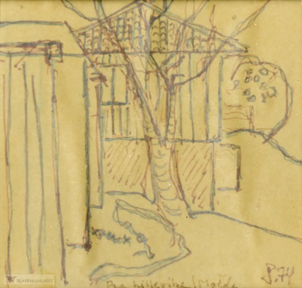 Et hus, med deler av en bygning til venstre i bildet. Et tre foran huset, og en busk bak og til høyre.