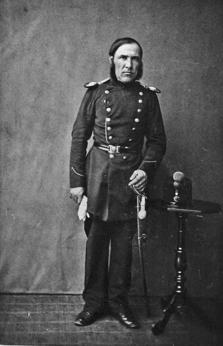 Portrett av mann i uniform. Halstein Olsen Rugsveen, Unset. Falt i borgerkrigen i USA på Nordstatens side. 
