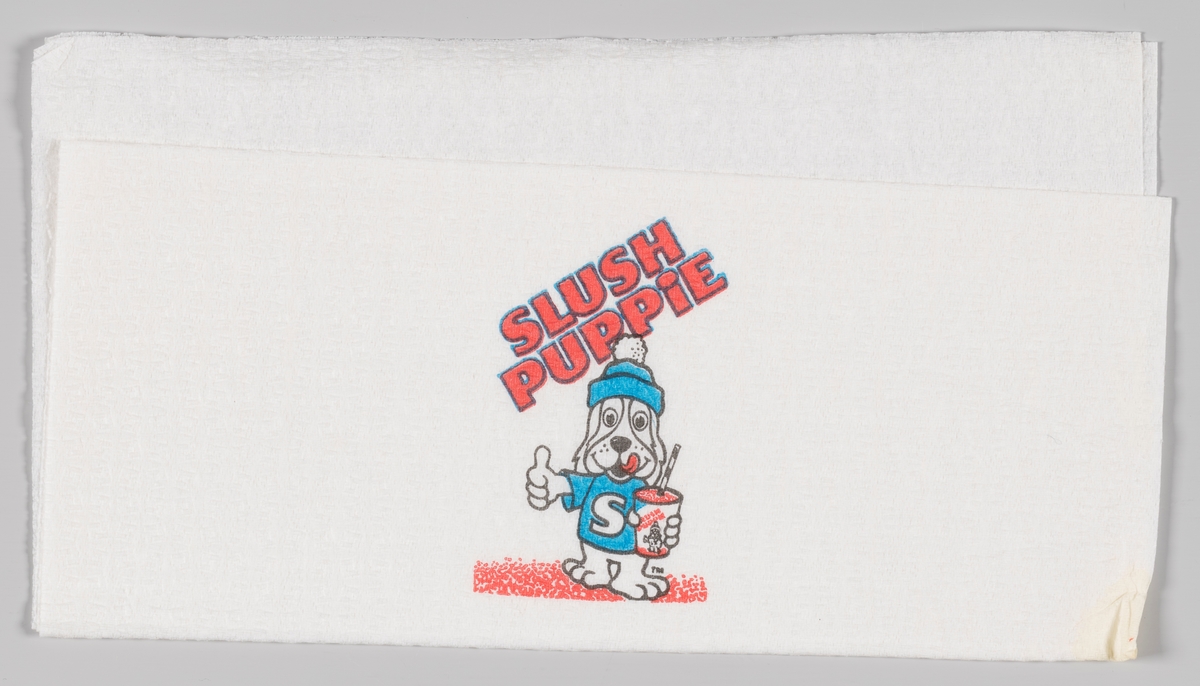 En valp kledt i lue og t-shirt med bokstaven S holder en beholder med Slush og peker med tommelen opp. Reklametekst for Slush Puppie.

Slush Puppie er en leskedrikk som kom på markedet i 1970 i USA. Produktet eies av J & J Snack Foods.