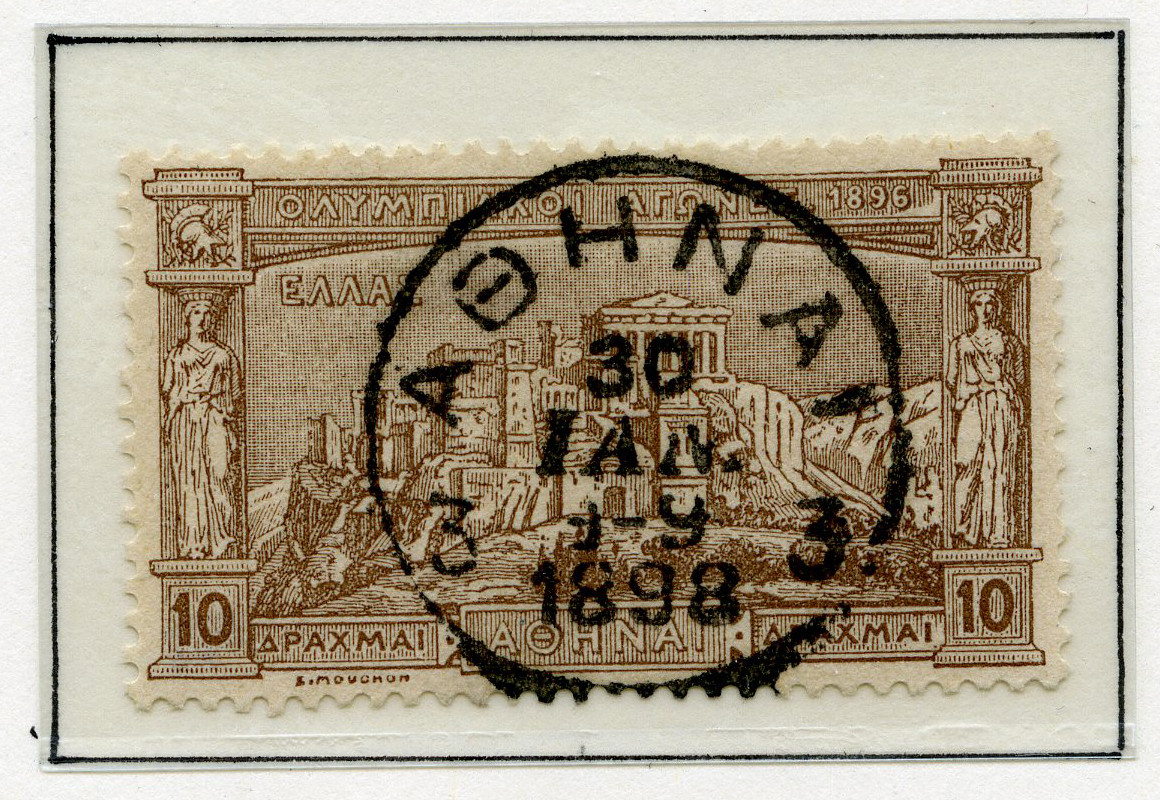 A4 ark av kartong med 12 frimerker med motiv fra de antikke olympiske leker. To av frimerkene er stemplet 30. IAN 1898. Tekst øverst på arket sammen med de olympiske ringer.