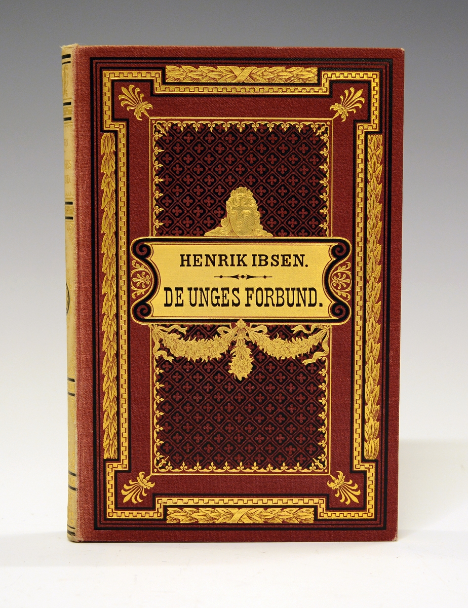 Ibsen, Henrik: De unges forbund. Rødt helshirtingsbind med preget dekor i gull og sort, helt gullsnitt. 
Femte opplag 1883.