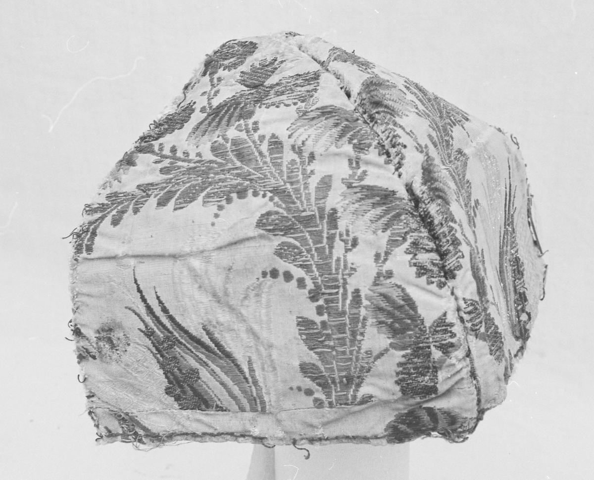 Tobladshette av silke med blomstermønster med fôr av lerretsvevd lin (eller bomull)